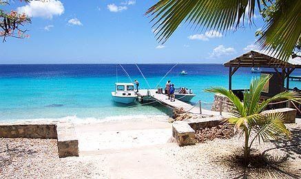 The beach and dock at Bruce Bowker's Carib Inn.