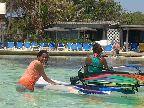 Anyone can learn windsurfing in the shallow waters of Bonaire's Lac Bay.